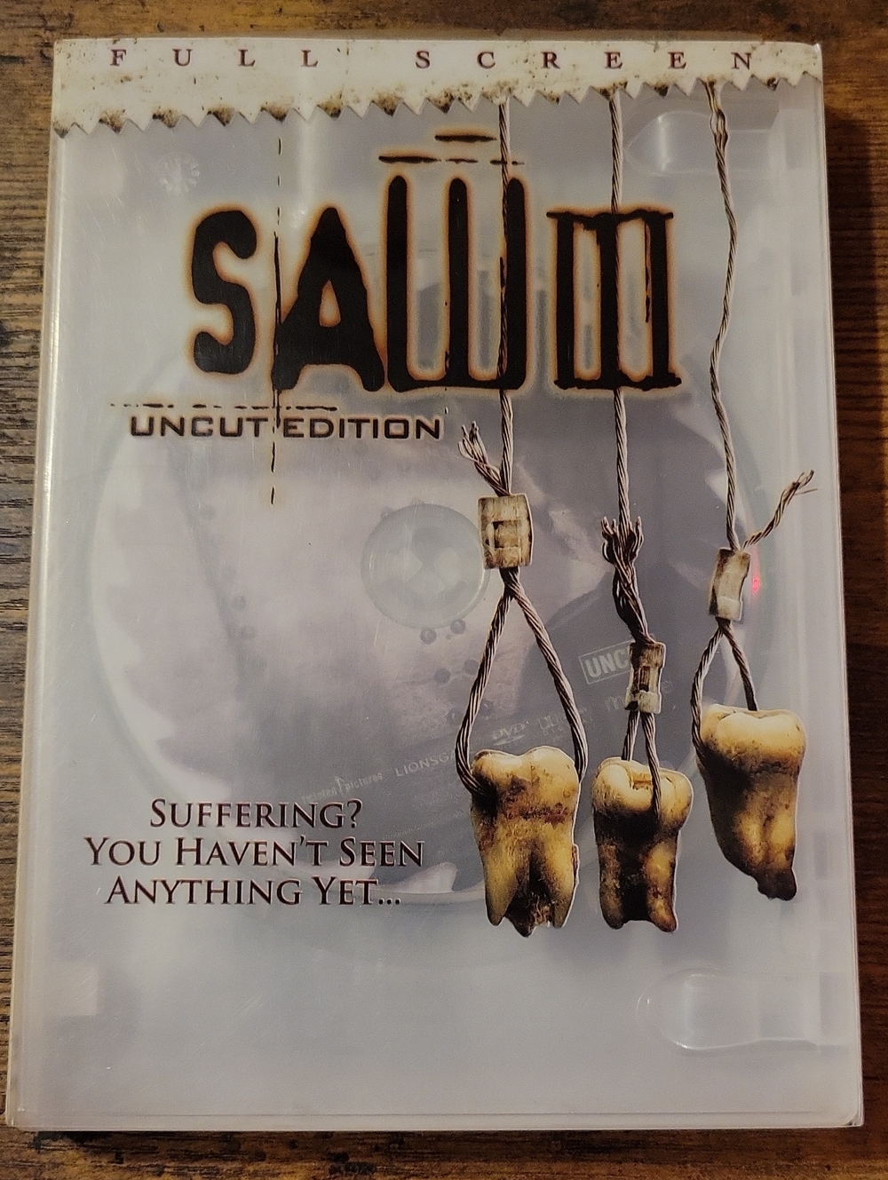 SAW III Uncut Edition DVD — White & Brown Cover Art